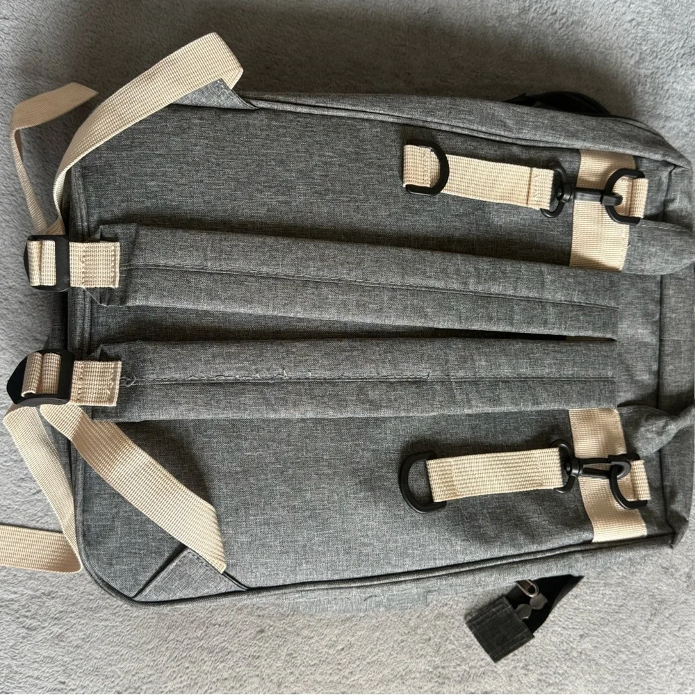 Gray Baby Backpack/Diaper Bag with fold out portable bassinet